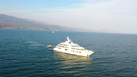 Aerial-Over-A-Large-White-Private-Yacht-Cruising-Off-The-Coast-Of-Santa-Barbara-California-2