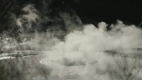 Boiling-hot-geothermal-volcanic-mud-pool,-closeup-shot-steamy-lake