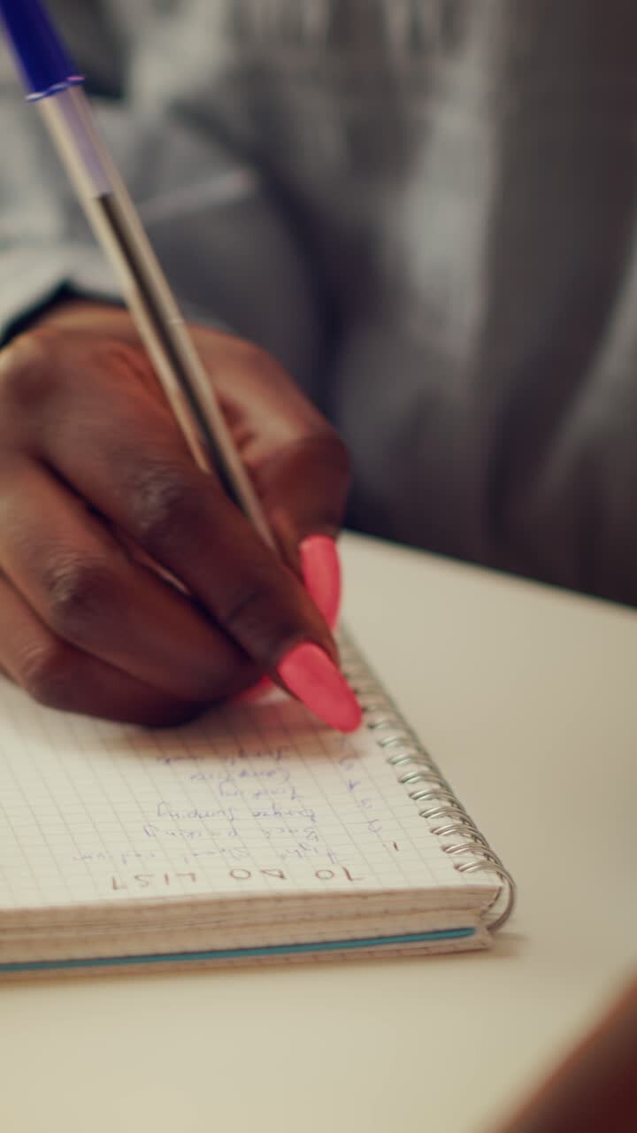 Vertical Woman taking handwritten ideas notes