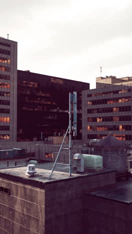 aerial view of a city rooftop at dusk