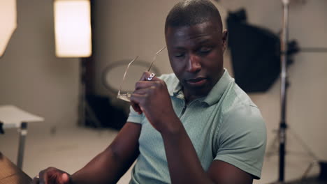 a frustrated man in a studio