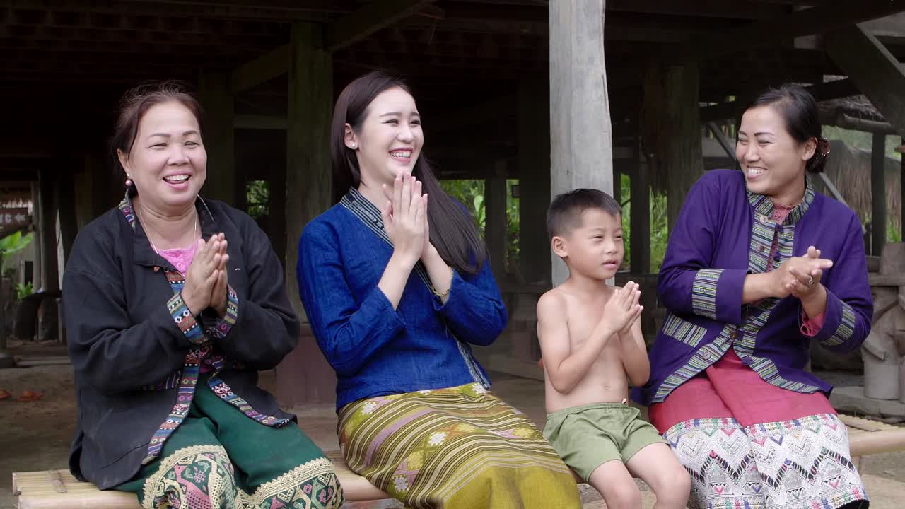 Family Gathering in Traditional Thai Attire