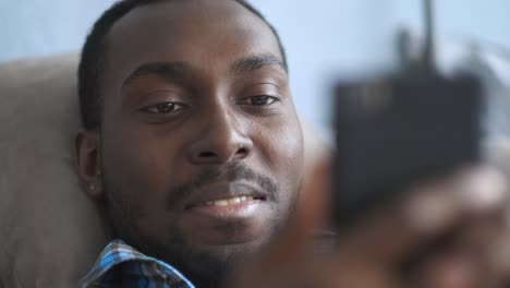 man looking at smartphone