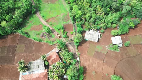 jcb on village road drone shot bird eye view