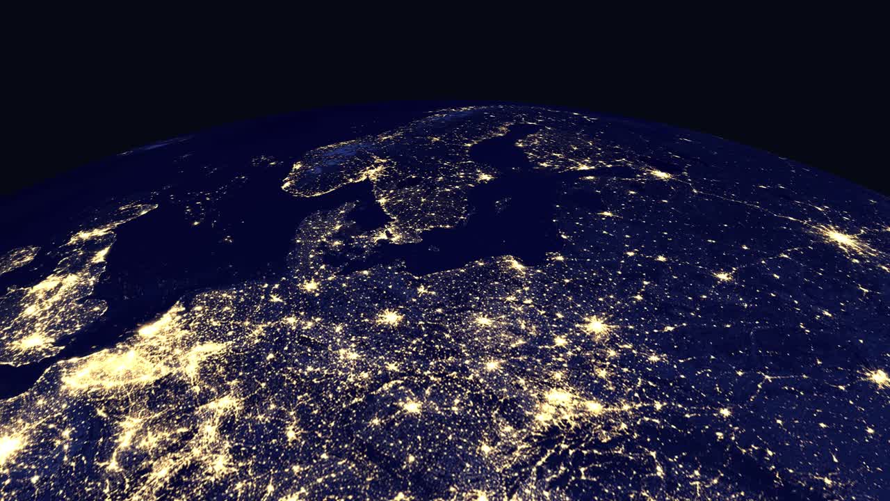 Digital globe rotates and zooms into illuminated European cities at night with country labels appearing