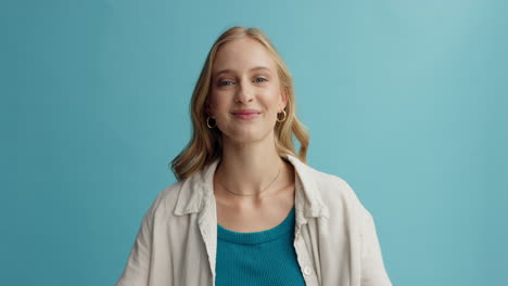 happy woman making heart shape with hands