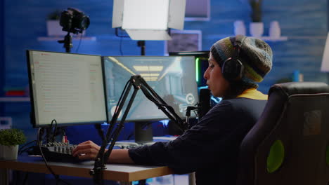 Pro streamer checking sound on mixer and putting on headset