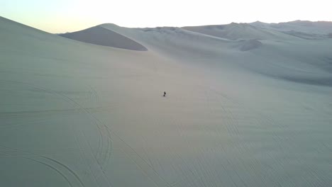 atacama desert people isolated with surrounding sand dunes in peru, south america