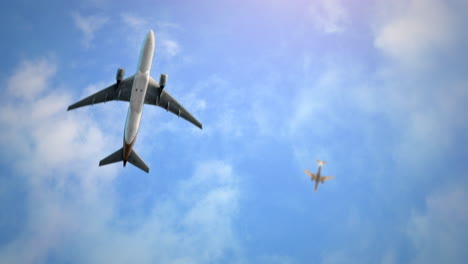 fly airplanes in blue sky with clouds