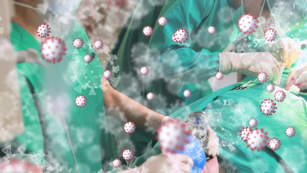 수술실의 외과 의사들에 대한 코로나19 바이러스 세포의 애니메이션