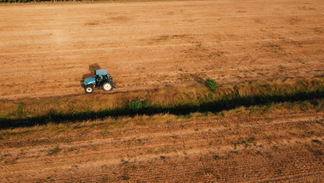 aerial view of tractor working in a field