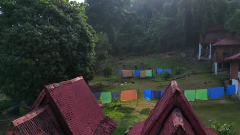 Laundry,-Huts-on-the-empty-sandy-beach-with-palm-tree-in-the-morning