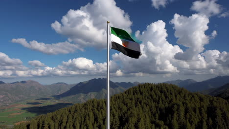 jordan flag flying over mountains