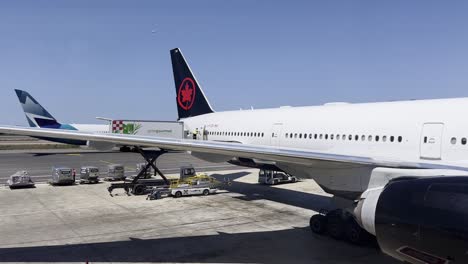 air canada boeing 777 cargo loading at airport