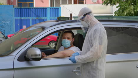 man gives a test for coronavirus