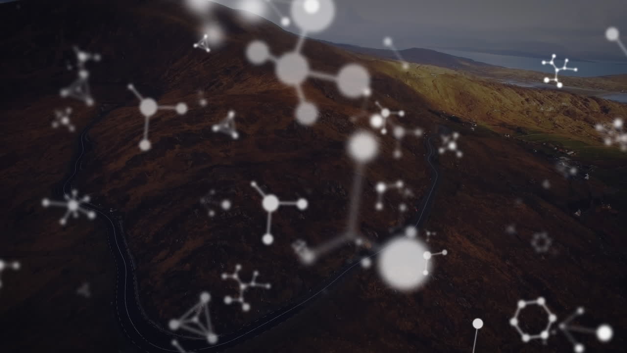 animación de moléculas que caen sobre el paisaje marino