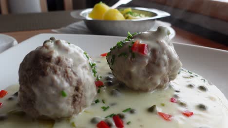 Meatballs-with-white-sauce-Koenigsberger-Klopse-traditional-German-dish