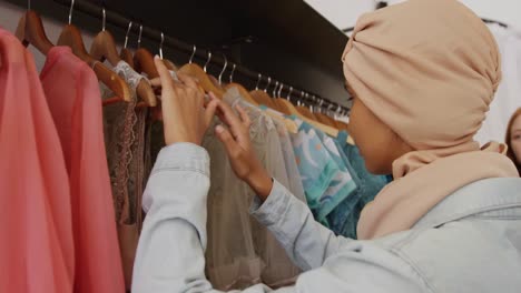 young woman in a clothes shop