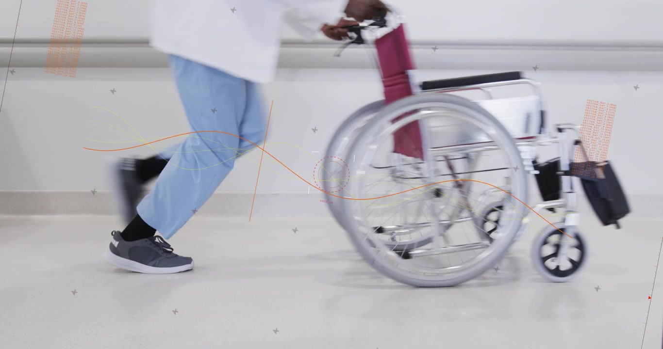 Wheelchair entering left, man dashing pushing it across medical ward, orange overlay behind