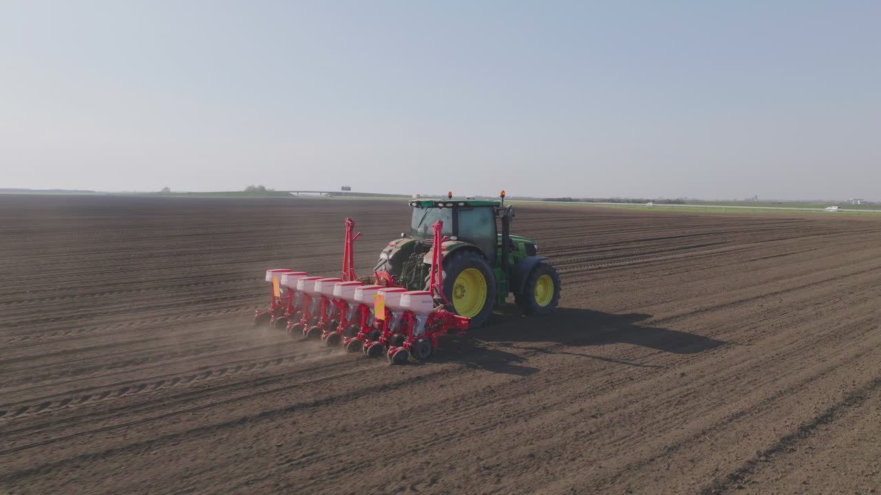 Tractor Seeding a Field