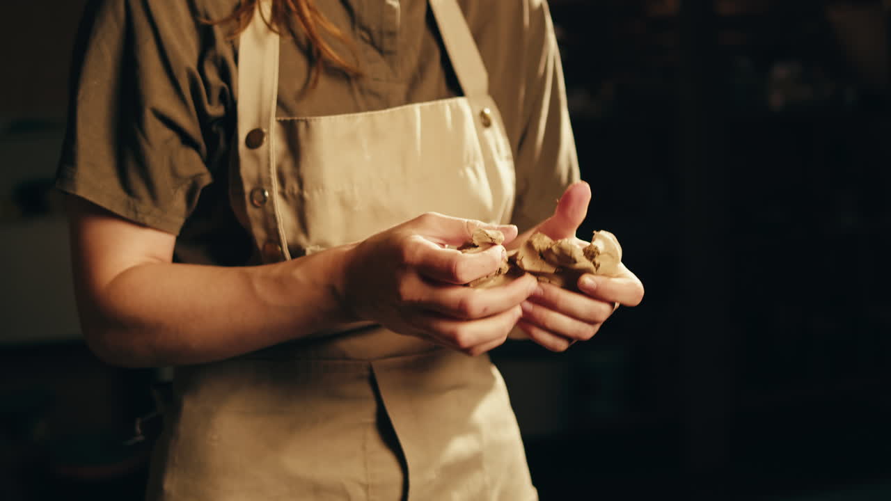 Woman Shaping Clay
