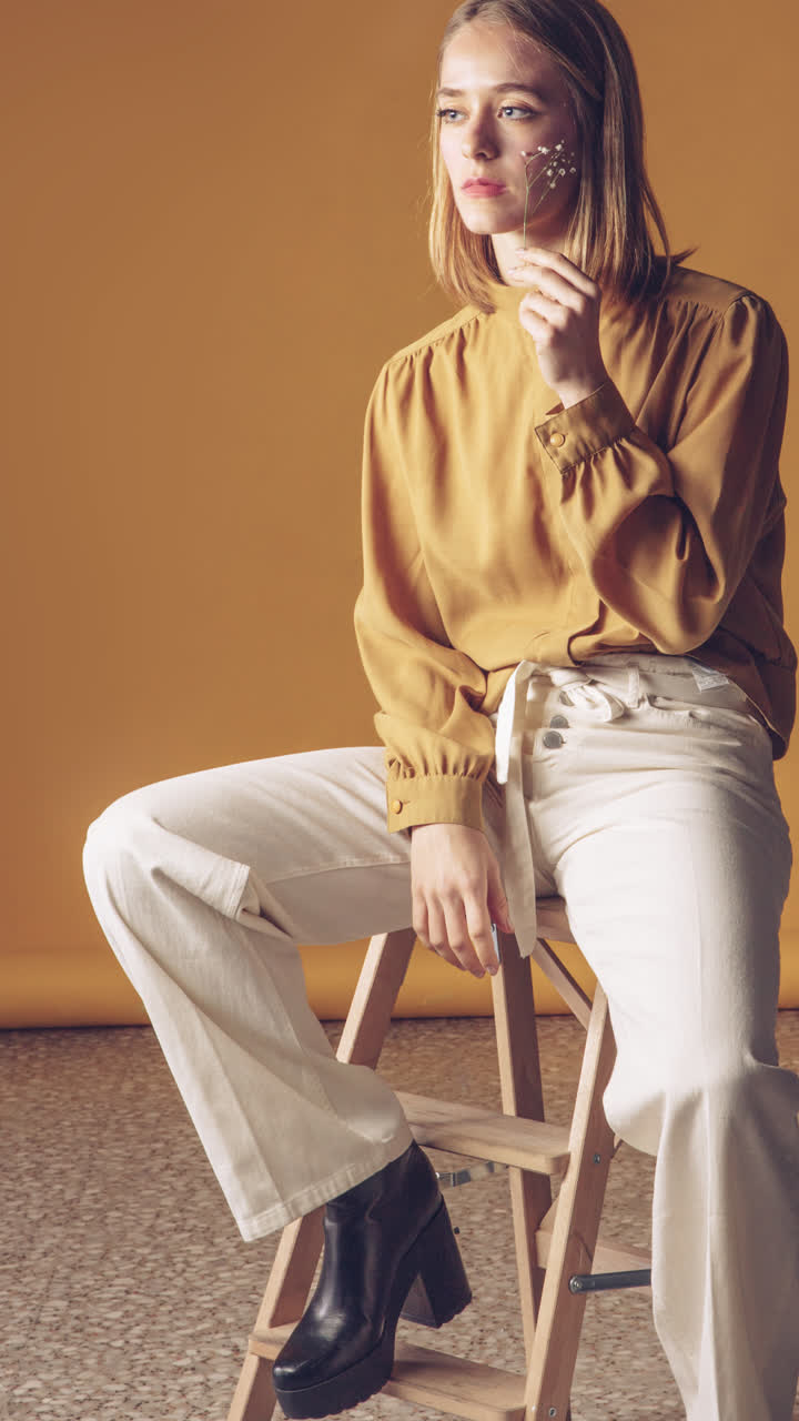Fashion Portrait of a Woman with a Flower