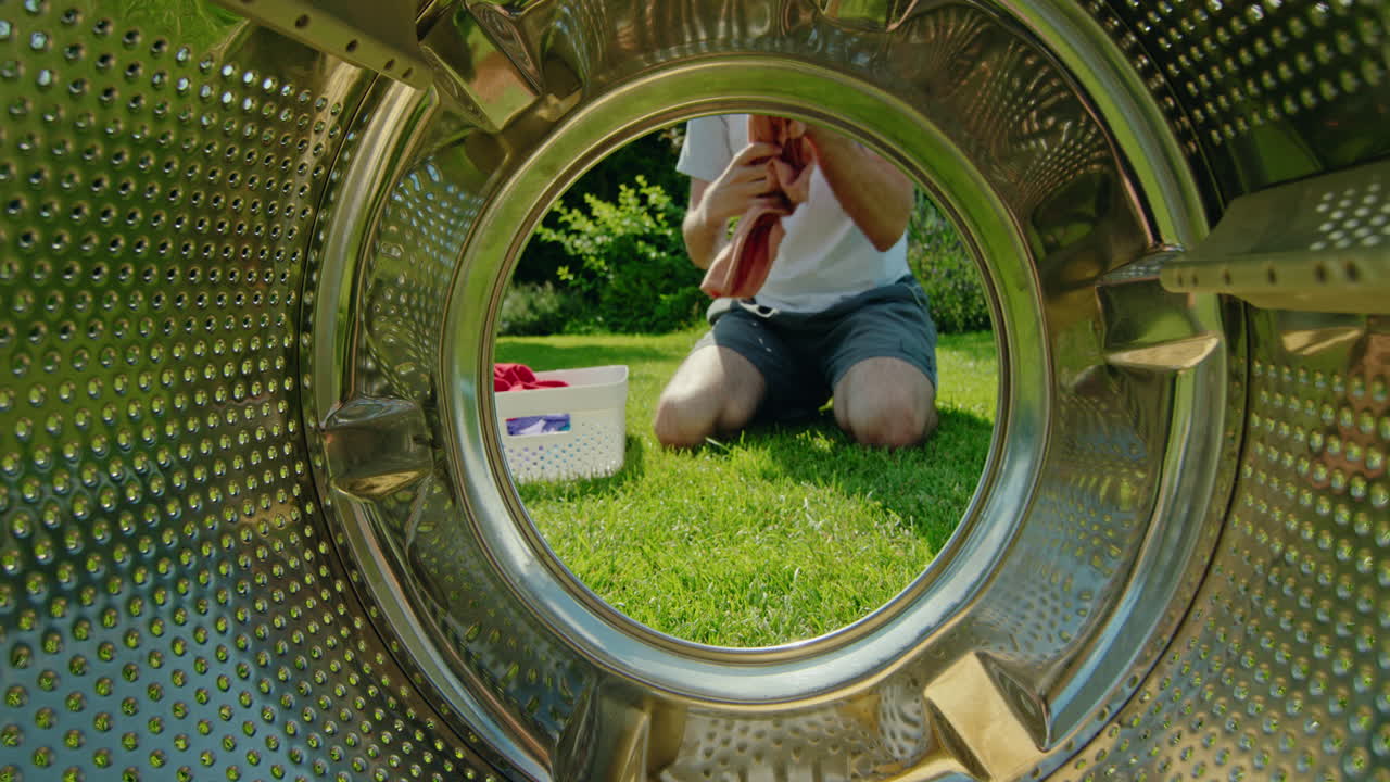 Loading a Washing Machine Outdoors