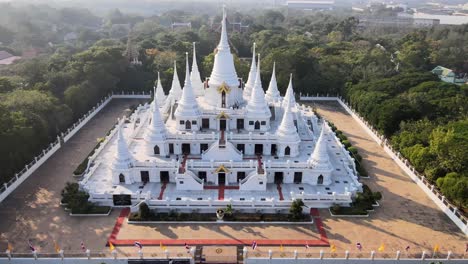 4k cinematic panning towards wat asokaram temple at sunset in samut prakan, bangkok, thailand