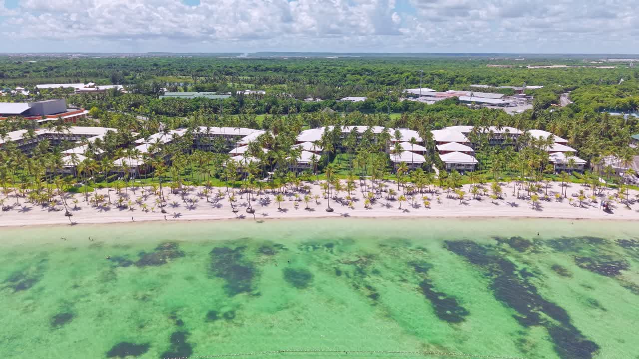 Tropical Resorts At Bavaro Beach In Punta Cana, Dominican Republic. Aerial Tracking Shot