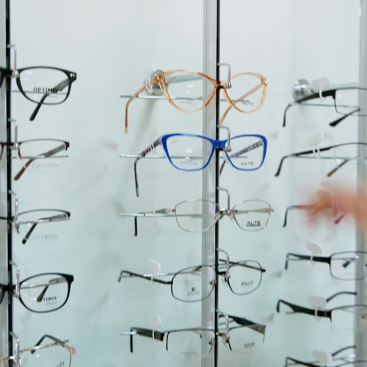 Woman choosing glasses