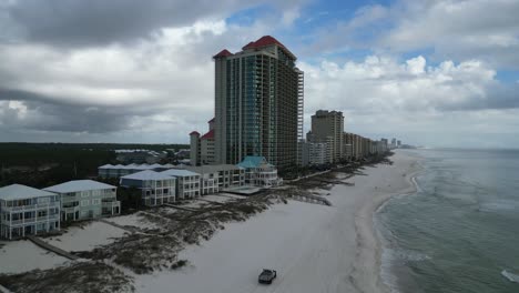 Aerial-view-of-a-high-rise-condo-near-Orange-Beach,-Alabama