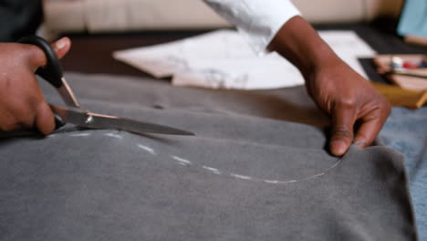 closeup of people working at the tailor shop