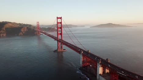 view of golden gate bridge and san francisco at sunrise aerial drone