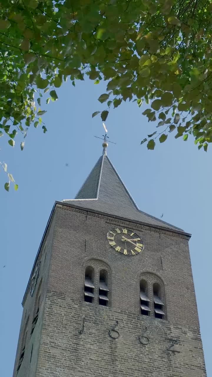 View of a Church Tower with a Clock
