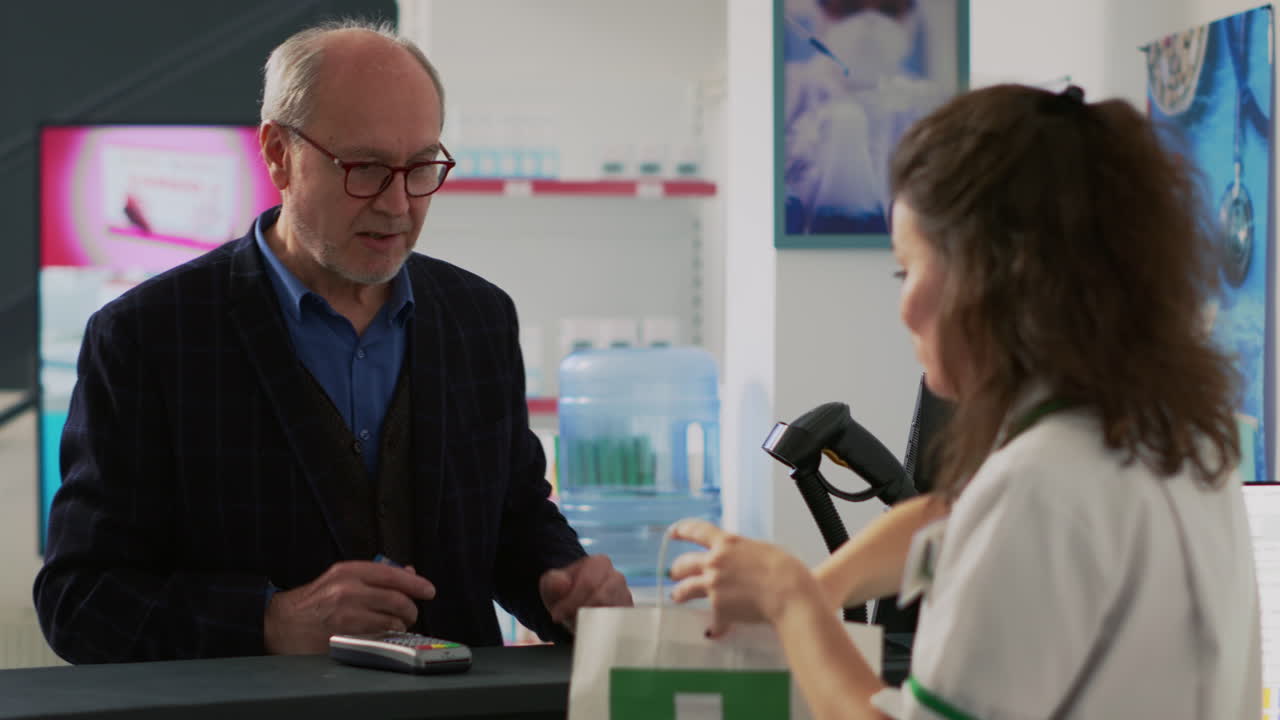Customer Paying at Pharmacy Counter