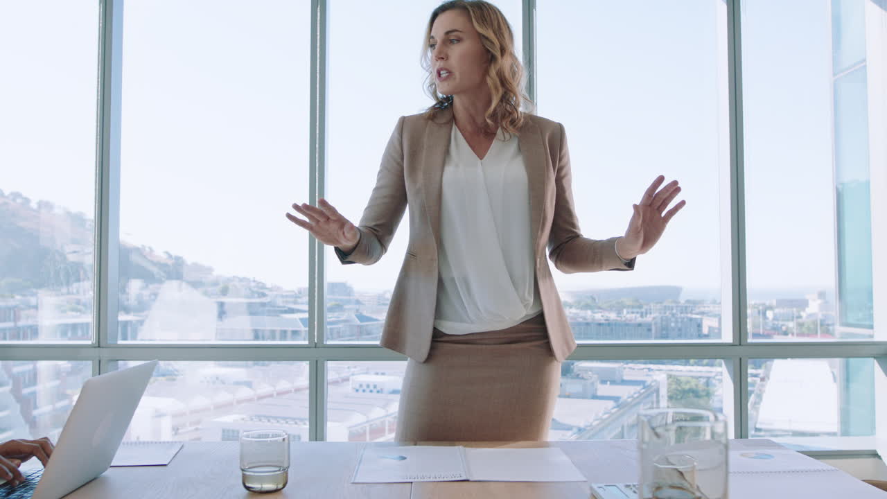beautiful business woman team leader discussing creative ideas with shareholders briefing colleagues sharing company development strategy in office boardroom meeting 4k