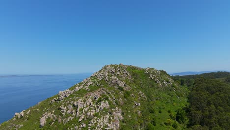 Rocky-Slope-And-Peak-Of-Mountain-Overlooking-The-North-Atlantic-Ocean-In-Summer