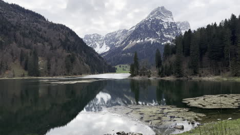 beautiful majestic swiss alps landscape reflecting in obersee lake