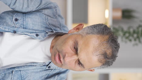 Vertical-video-of-Angry-man-with-high-bill.