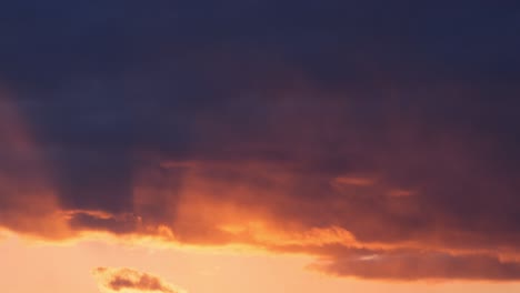 fiery red and deep blue sunset colors paint the sky in a vivid twilight landscape, heavenly beautiful backdrop background