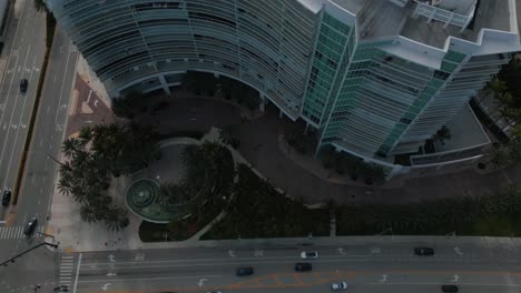 Top-Down-Aerial-View-of-Traffic-in-Pompano-Beach,-Florida-USA,-Boulevards-and-Condo-Building,-High-Angle-Drone-Shot