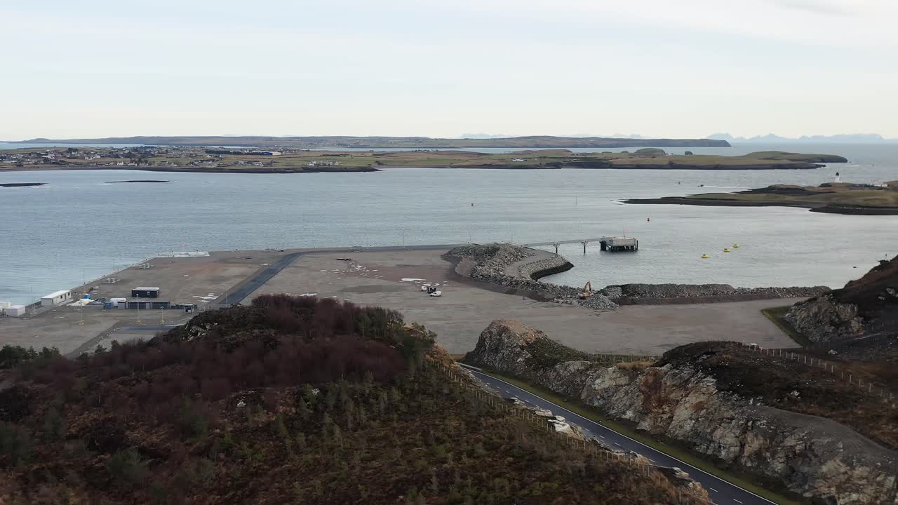 Drone shot flying over the Stornoway deep water port under construction