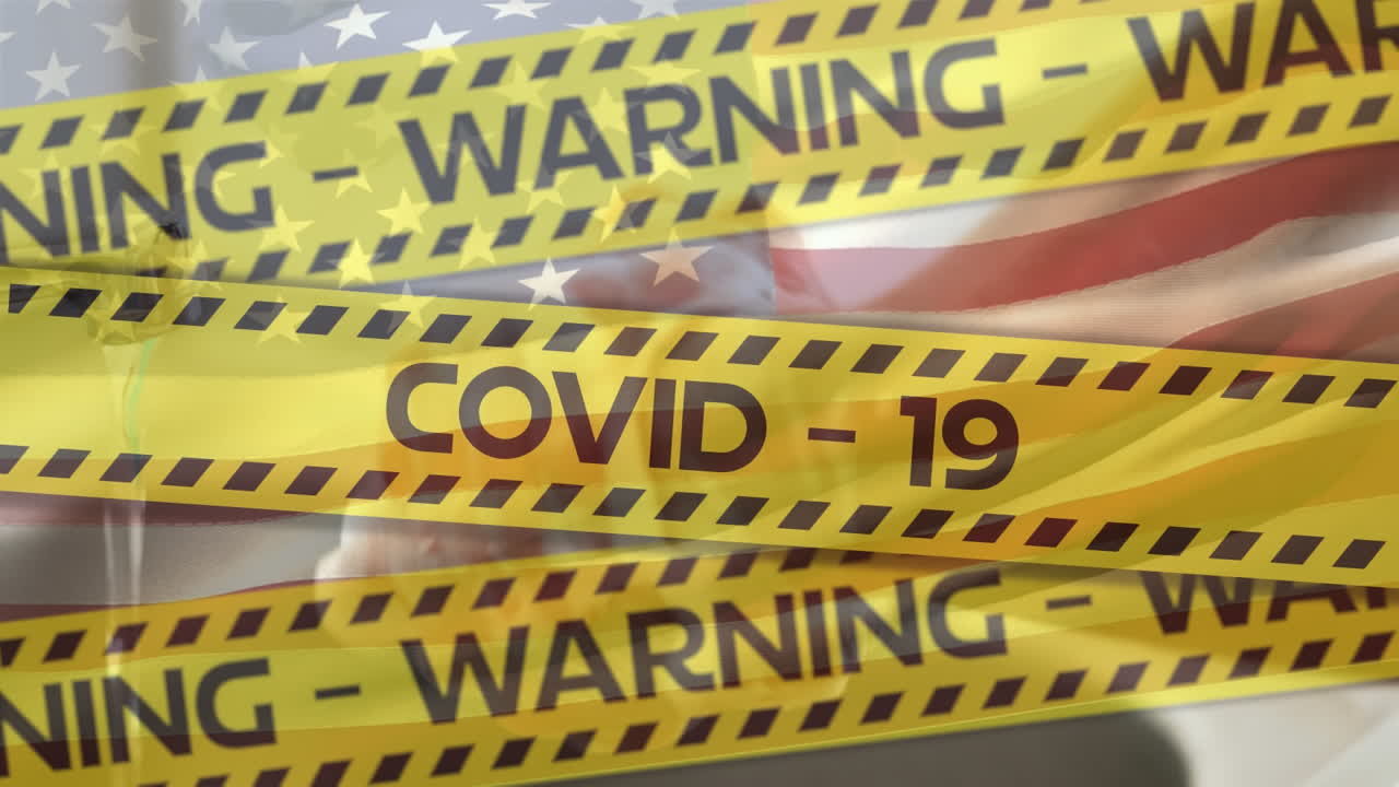 Nastri gialli della polizia sopra il lavaggio delle mani sullo sfondo di una bandiera americana che sventola.