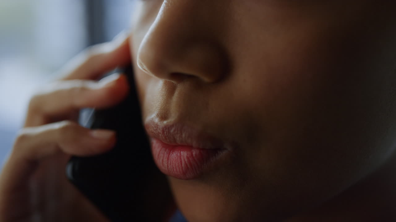 Businesswoman face calling on smartphone. Professional talking on cellphone