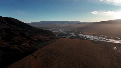 thorsmork nature reserve with riverbed during sunrise in southern iceland