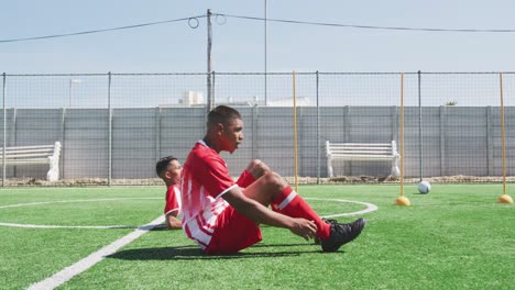 Soccer-players-training-on-field