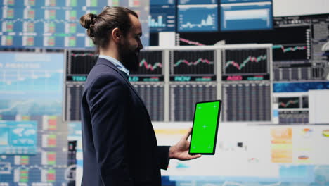 entrepreneur holds tablet with copy space screen and leveraging dashboards