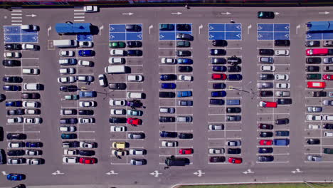 drone flies over a large used car parking lot