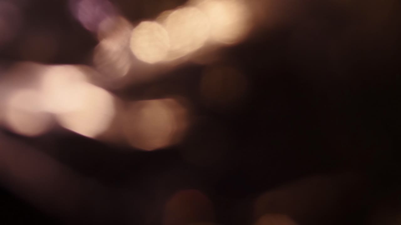 Abstract Light Leaks and Bokeh on Dark Background