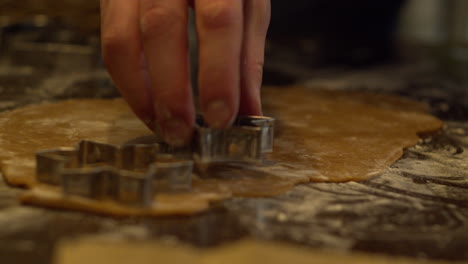 Cutting-gingerbread-dough-with-different-cutting-forms